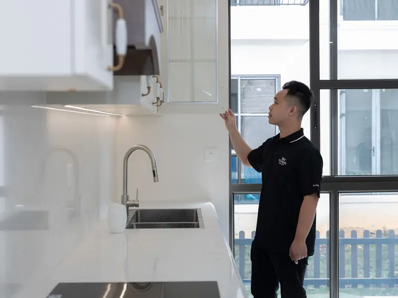 HVAC technician reviewing options with a homeowner
